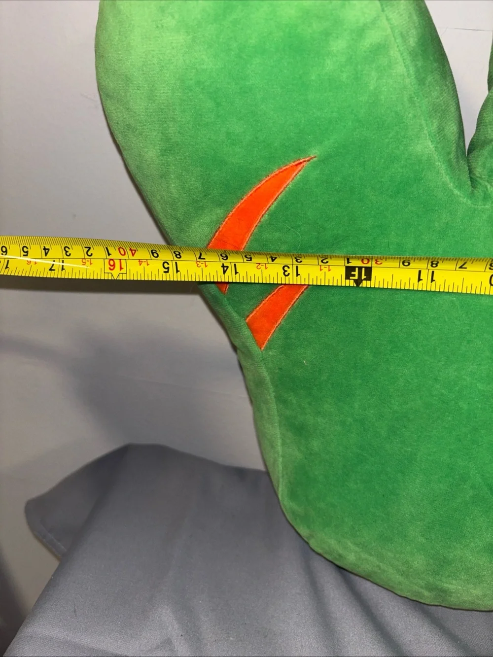 Hobby lobby green dinosaur foot throw pillow